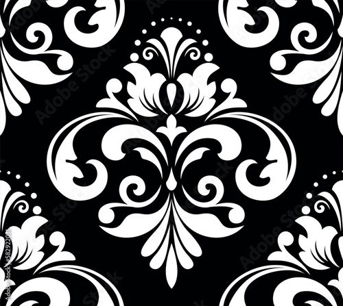 Wallpaper in the style of Baroque. Seamless vector background. White and black floral ornament. Graphic pattern for fabric, wallpaper, packaging. Ornate Damask flower ornament
