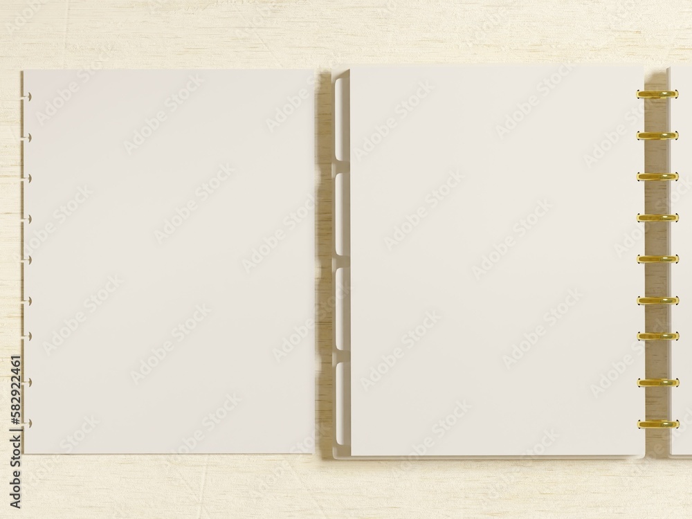 Open discbound planner mockup on desk with blank planner inserts. Top