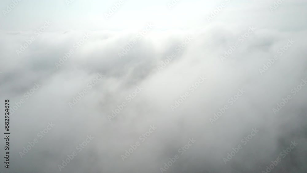 Top view Landscape of Morning Mist with Mountain Layer at north of Thailand. mountain ridge and clouds in rural jungle bush forest Top view Landscape of Morning Mist with Mountain Layer at north of Thailand. mountain ridge and clouds in rural jungle bush forest