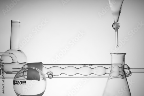 Front view of laboratory glassware on white background. Research and develop beauty skincare product concept by scientific method with concept laboratory tests photo