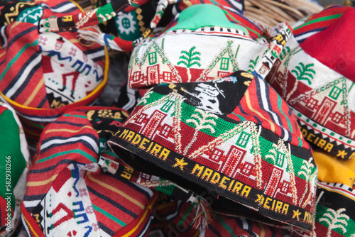 Assortment of colorful souvenir woolen hats of Madeira islands