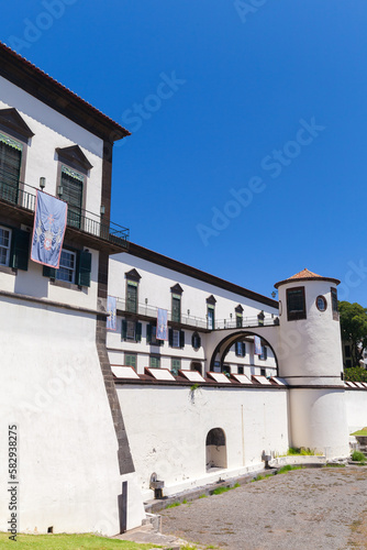 Palace of Sao Lourenco on a sunny summer day. Vertical street view photo
