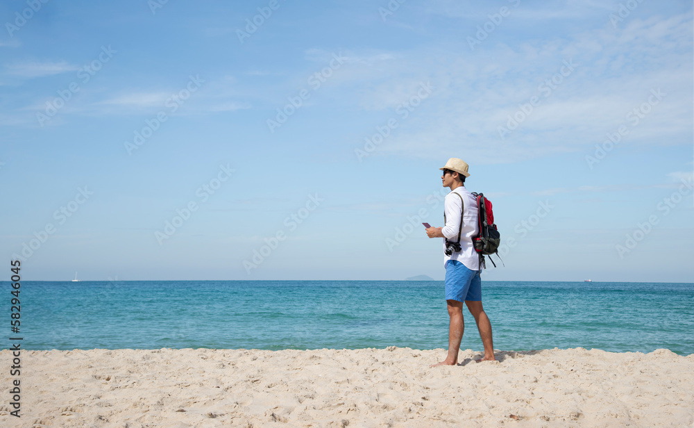 Lifestyle man and relax chill on beach background. Travel summer vacations, copy space for banner.Summer vacations