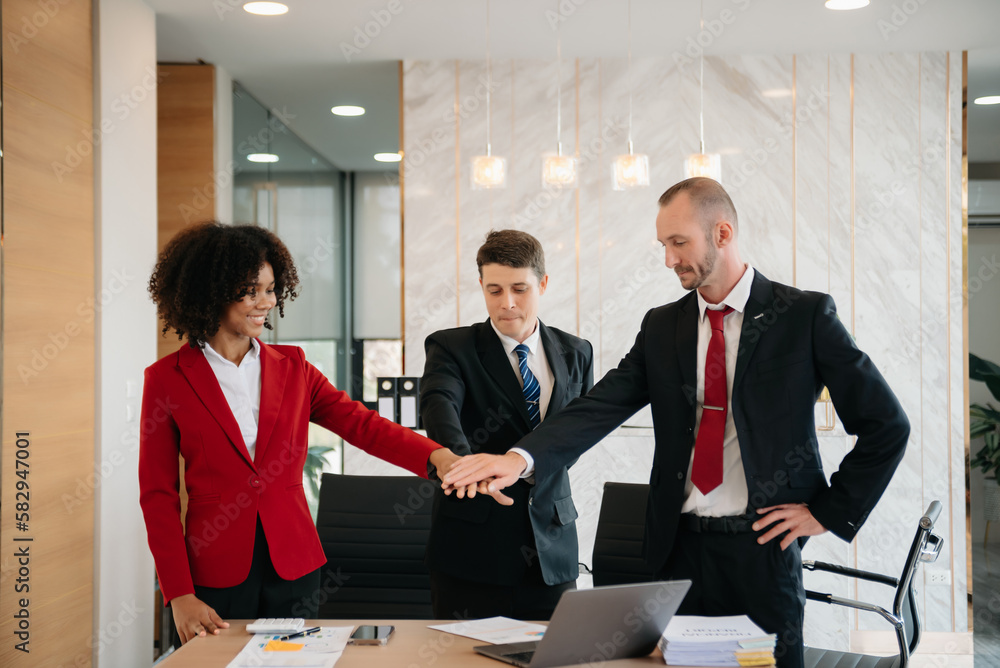 business people shaking hands during a meeting in office. business people shaking hands during a meeting in office.