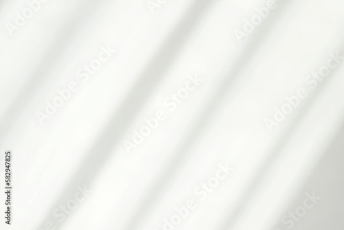 Blank white background with shadows, soft beautiful sunlight in spots, abstract background for presentations, design