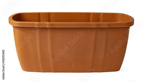 Brown plastic flower pot isolated on a white background