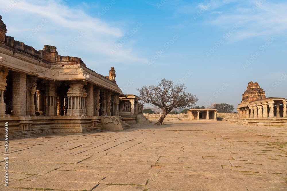 Ancient stone architecture ruins inside Vijaya Vittala temple at Hampi, Karnataka, India