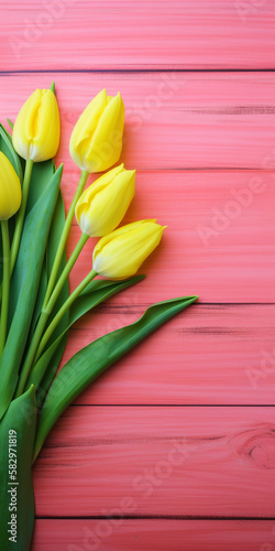 Tulip border with copy space. Bouquet of yellow tulips flowers on pink vintage wooden background. generative ai. Beautiful frame composition of spring flowers