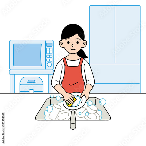 食器を洗う主婦
