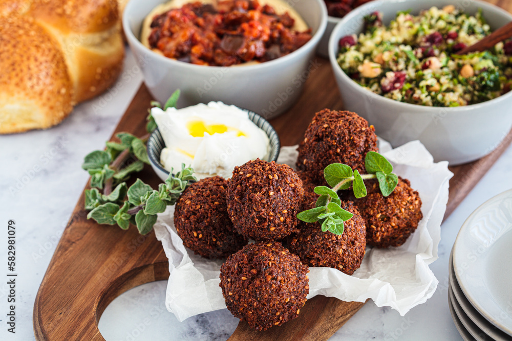 Falafel on wooden party pletter. Israeli food concept. Falafel on wooden party pletter. Israeli food concept.