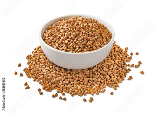 Full buckwheat bowl in the middle of buckwheat pile isolated on white background © kovaleva_ka
