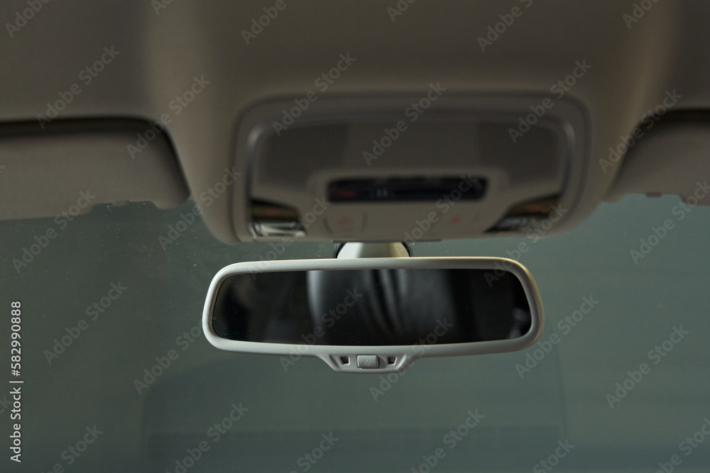 car interior rear-view mirror with auto dimming button