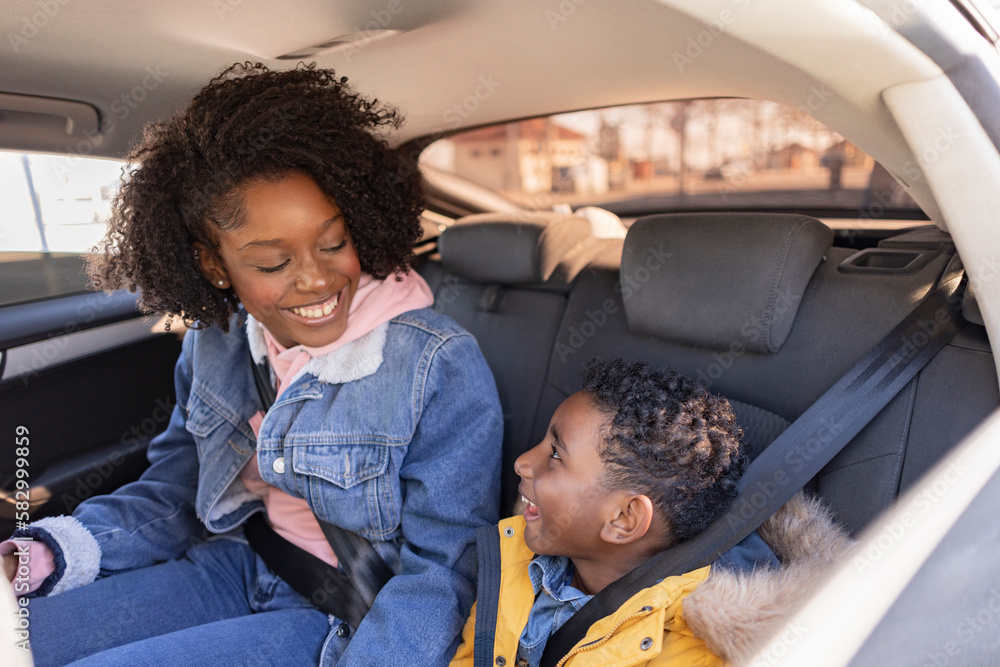 Happy mother and son having fun in car Happy mother and son having fun in car