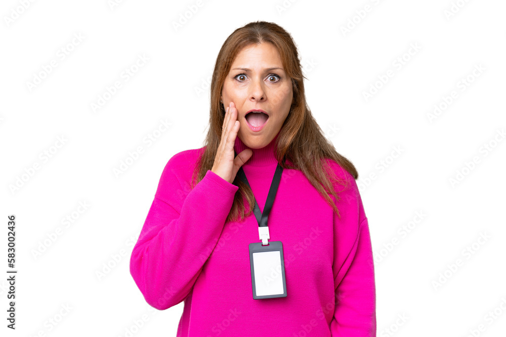 Middle-aged caucasian woman with ID card over isolated background with surprise and shocked facial expression Middle-aged caucasian woman with ID card over isolated background with surprise and shocked facial expression