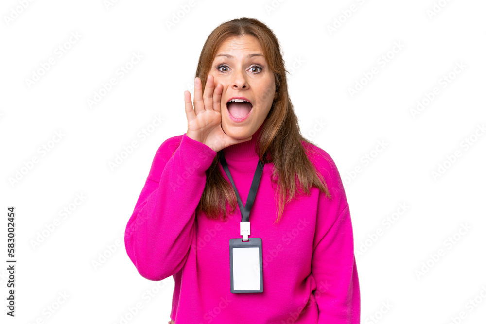 Middle-aged caucasian woman with ID card over isolated background shouting with mouth wide open Middle-aged caucasian woman with ID card over isolated background shouting with mouth wide open