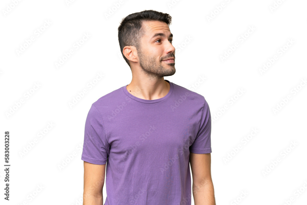 Young handsome caucasian man over isolated background looking to the side Young handsome caucasian man over isolated background looking to the side