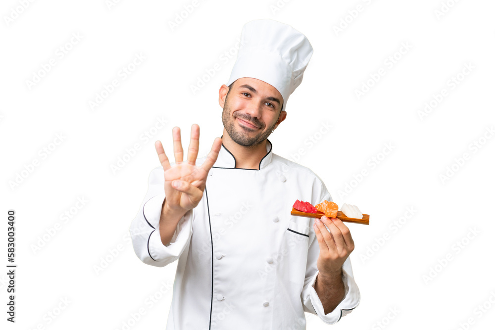 Young caucasian chef holding a sushi over isolated background happy and counting four with fingers Young caucasian chef holding a sushi over isolated background happy and counting four with fingers