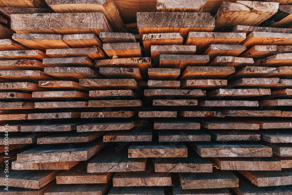 Stack of wooden planks solid-sawn timber construction material