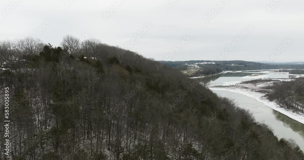 Winter Tree Forest With Shallow River Near Neills Bluff In Washington County, Arkansas, United States. Aerial Drone Shot Winter Tree Forest With Shallow River Near Neills Bluff In Washington County, Arkansas, United States. Aerial Drone Shot
