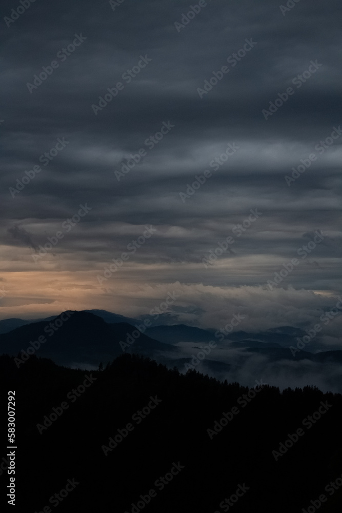 time clouds over the mountains