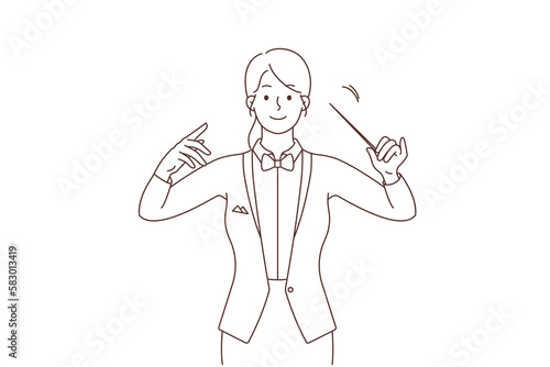 Female conductor with baton in hands 
