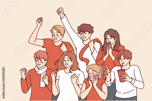 Men and women baseball fans shout and wave hands to support athletes from favorite team during championship. People fans are relaxing in stadium enjoying watching baseball game of student team 