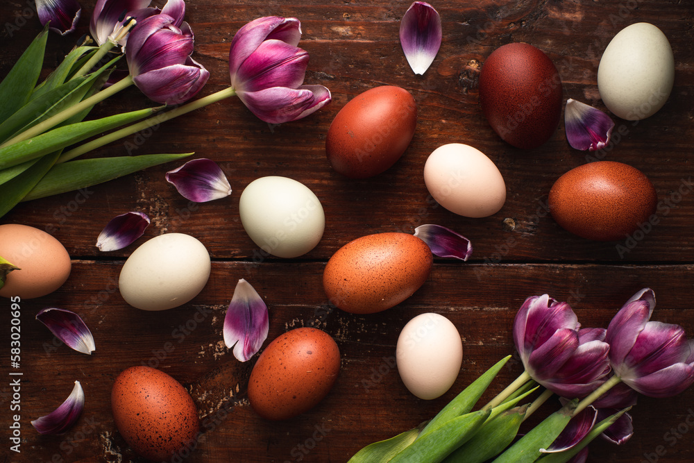 easter natural color eggs and tulips on old rustic table easter natural color eggs and tulips on old rustic table