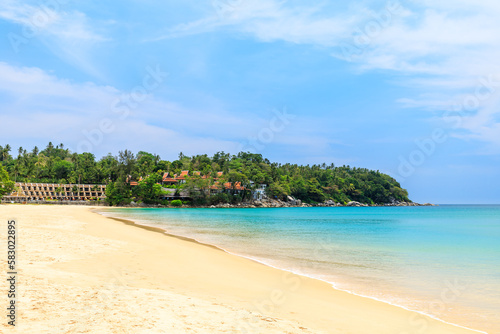 Karon Beach with crystal clear water and wave, famous tourist destination and resort area, Phuket, Thailand