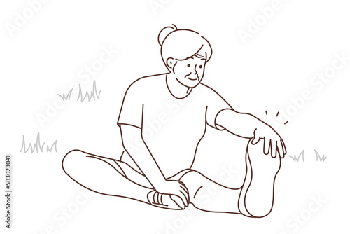 Active elderly woman training in park 
