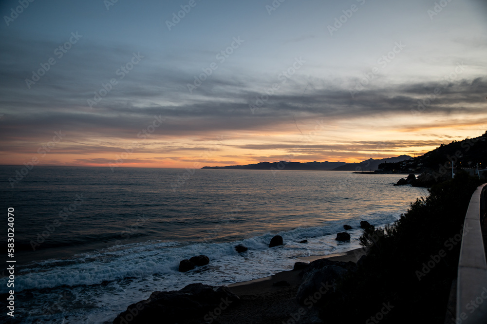 Sunset on the sea of Varigotti in Liguria, Italy