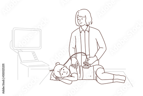 Female doctor do ultrasound of girl in clinic 