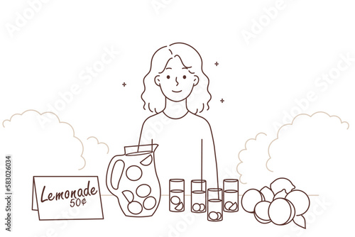 Small girl sell lemonade outdoors