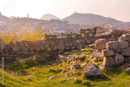 Plovdiv, Bulgaria sunset cityscape view of city and the ruins of the old fortress Nebet Tepe
