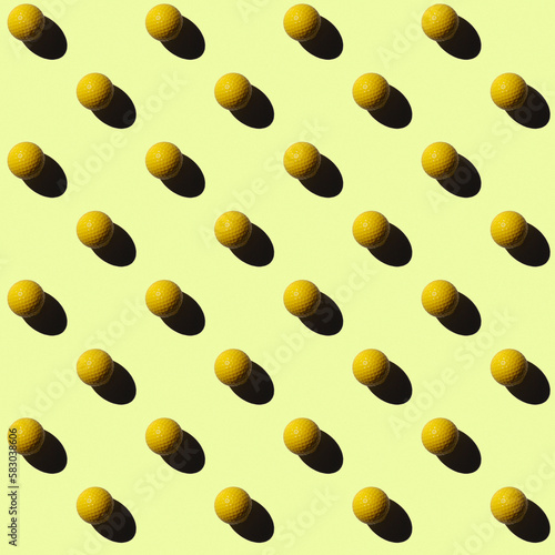 golf ball pattern on yellow background with sharp shadow