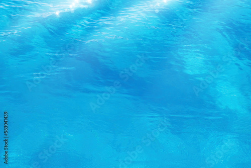 Clear transparent blue water texture; beautiful summer tropical holiday suny sandy beach background