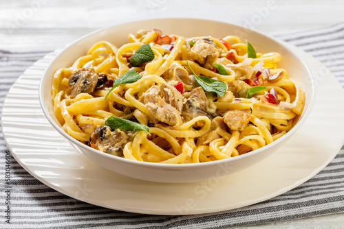 linguine Alfredo with Chicken, Mushroom in bowl