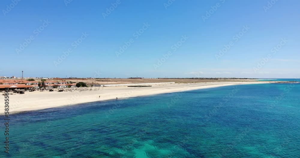 Aerial View Over Beautiful Blue Turquoise Ocean Waters Beside Idyllic Beach. Slow Dolly Flying Forward Aerial View Over Beautiful Blue Turquoise Ocean Waters Beside Idyllic Beach. Slow Dolly Flying Forward