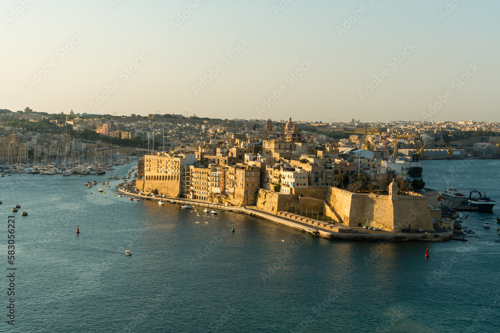 Malta, Valletta, August 2019. View of an old fortress in a large harbor.