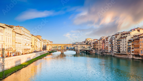 Ponte Vecchio over the Arno river at sunset, in Florence, Tuscany in Italy © FredP