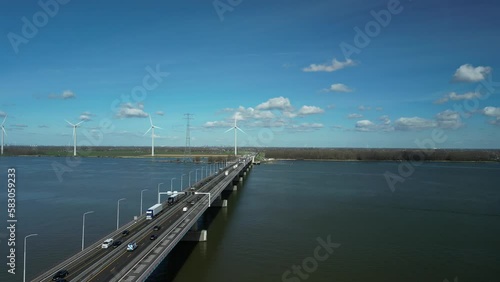 Wallpaper Mural Drone flies next to and above a bridge with a national highway over a river Torontodigital.ca