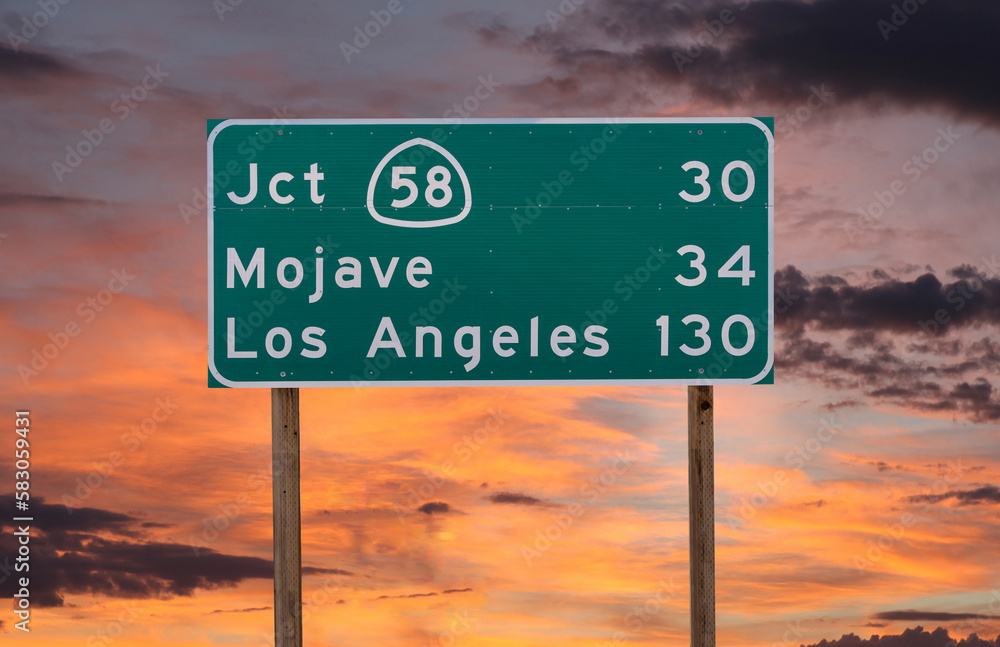 Mojave, Los Angeles and Route 58 junction highway sign with sunset sky ...