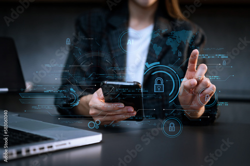 Cyber security and data protection. Business using computer and tablet protecting business and financial data with virtual from cyber attack, cybersecurity technology in office