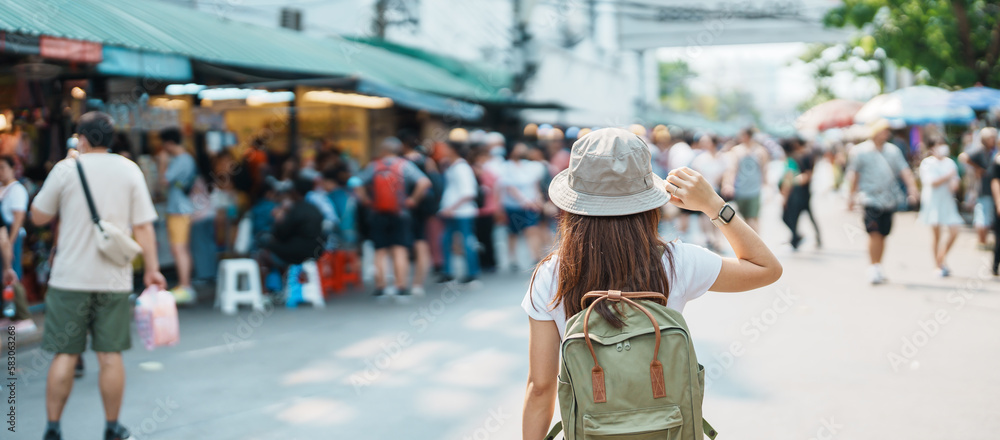 Premium Photo  Woman traveler visiting in bangkok tourist with backpack  and hat sightseeing in chatuchak weekend market landmark and popular  attractions in bangkok thailand travel in southeast asia concept