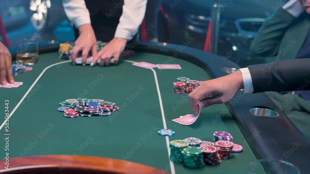 Professional poker players at the green table. Panning closeup shot. Professional poker players at the green table. Panning closeup shot.