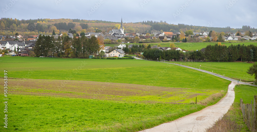 Panoramic view of German countryside landscape with villages in distance in Lampertstal und Alendorfer Kalktriften