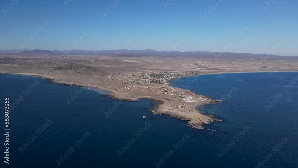 Aerial dolly over Bahia Asuncion coastal peninsula on clear blue day Aerial dolly over Bahia Asuncion coastal peninsula on clear blue day