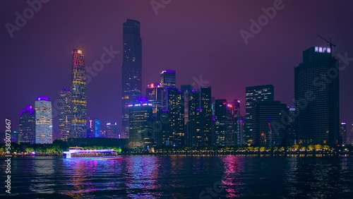 Wallpaper Mural Guangzhou cityscape skyline over the Pearl River with tourist boat illuminated in the evening. Guangzhou, China Torontodigital.ca