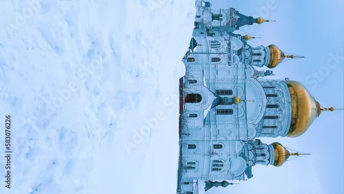 Belogorsky St. Nicholas Orthodox Missionary Monastery. Russia, Perm Krai, Belaya Gora. The temple on the hill in winter. Monastery on the background of snow. 4K photo