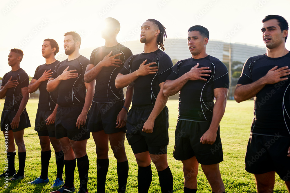 Keeping national pride. a diverse group of sportsmen standing together and singing their national anthem before playing rugby. Keeping national pride. a diverse group of sportsmen standing together and singing their national anthem before playing rugby.