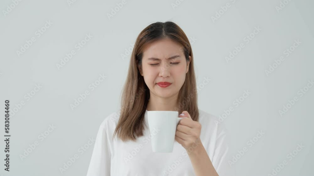 Asian woman feel sensitive teeth after drinking hot, female suffer tooth, decay problems, dental care, tooth extraction, decay problem, bad breath, Gingival Recession, Oral Hygiene instruction Asian woman feel sensitive teeth after drinking hot, female suffer tooth, decay problems, dental care, tooth extraction, decay problem, bad breath, Gingival Recession, Oral Hygiene instruction